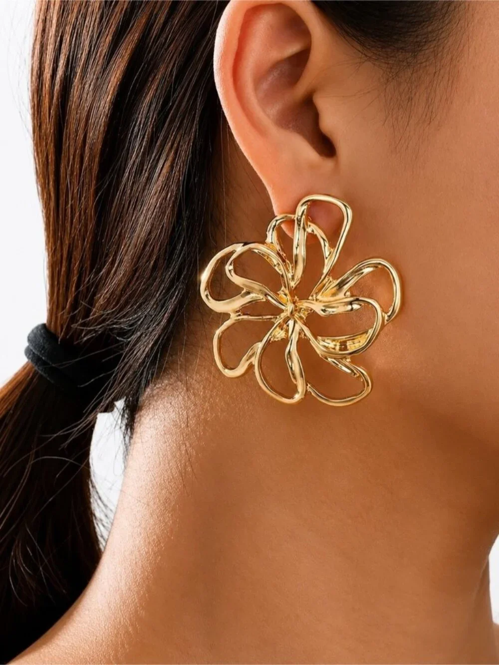 Polished Gold tone Floral Loop Earrings